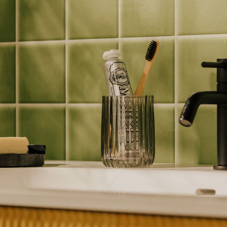 Toothbrush holder. A Cosmic-style bathroom