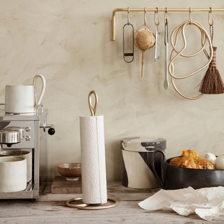 Soporte dorado para rollos de papel