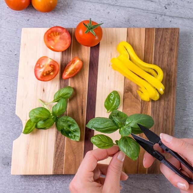 cutting self-grown vegetables