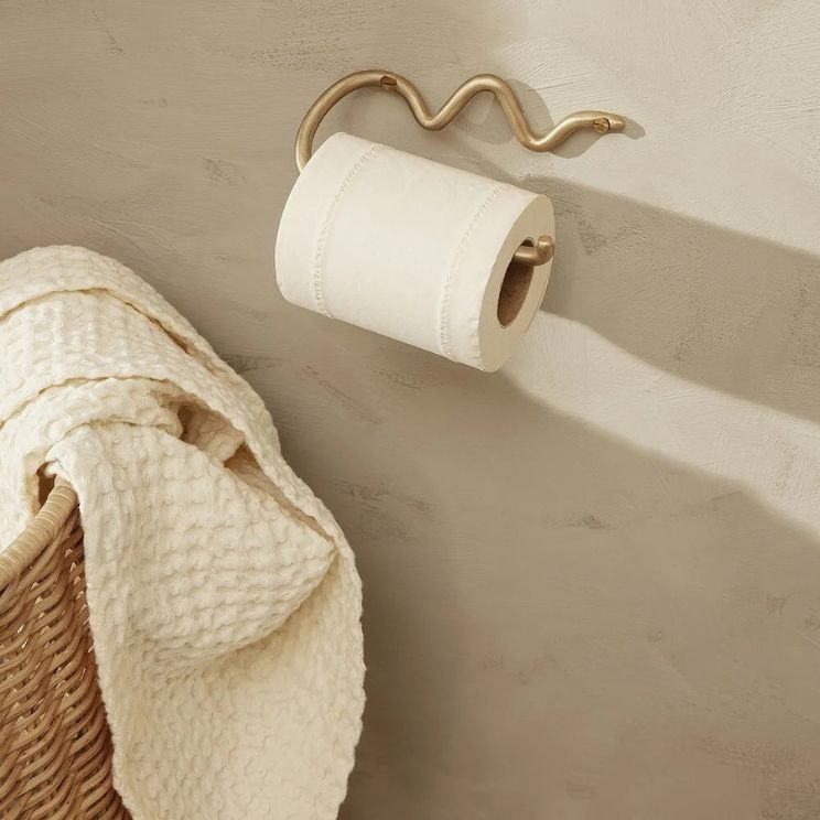 Porte-rouleaux et dérouleurs de papier toilette : un modèle doré de ferm living