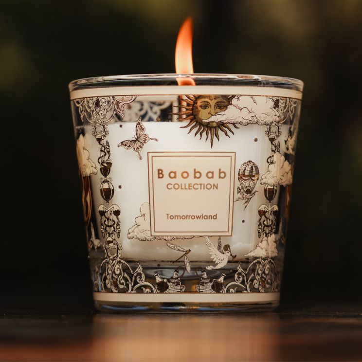 vela con aroma a pera, lirio del valle y musgo