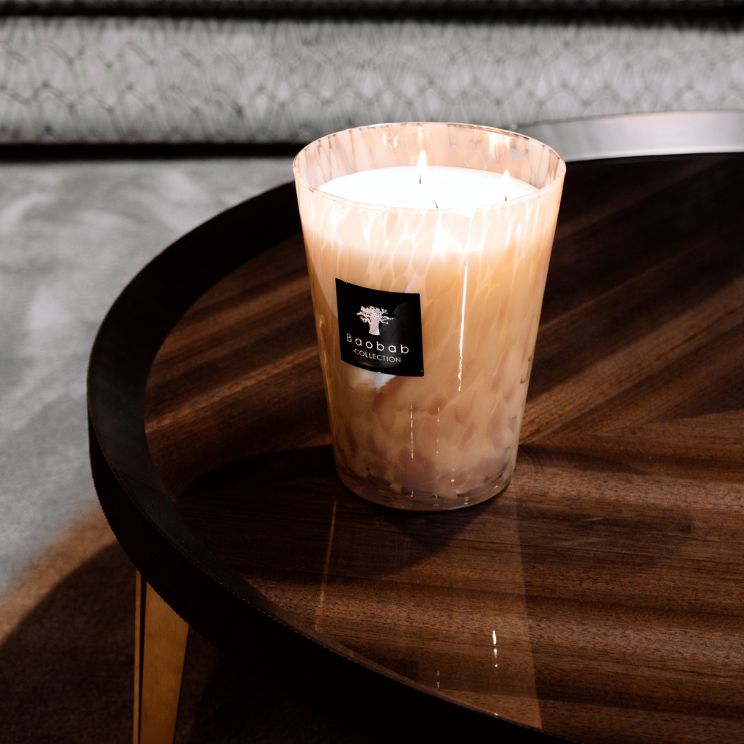 Una composición de fragancia única, que combina notas de orquídea, fresia y almizcle de Baobab Collection