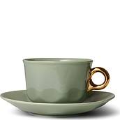 Sculpture Coffee cup green with a saucer