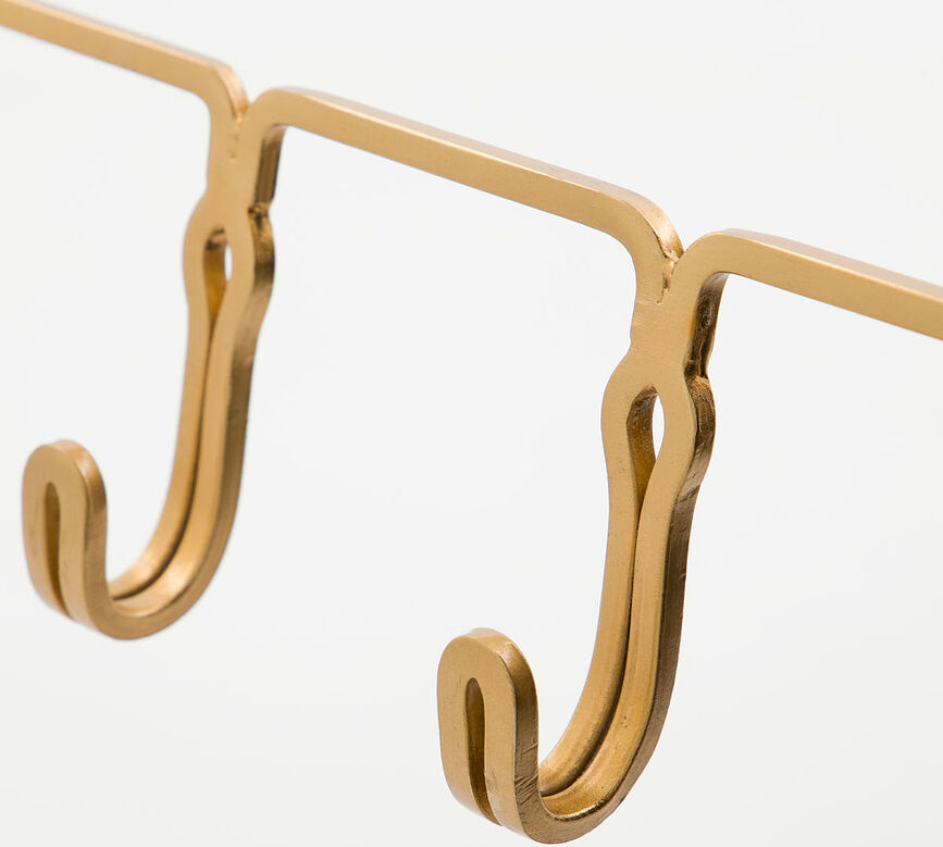 Gancho de pared de latón Yra