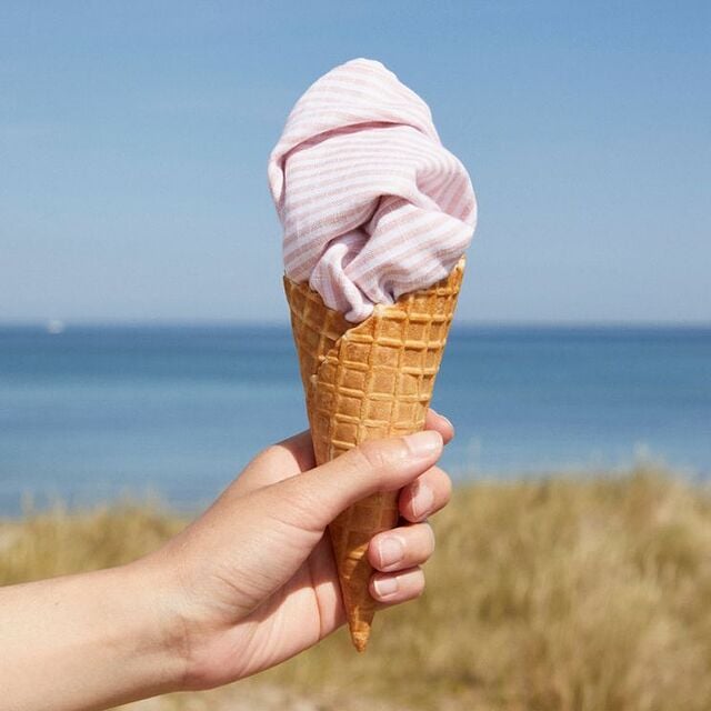 beach towel rolled up like an ice cream cone
