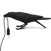Bird Lamp playing black outdoors