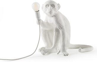 Galda lampa Monkey sēžot balta