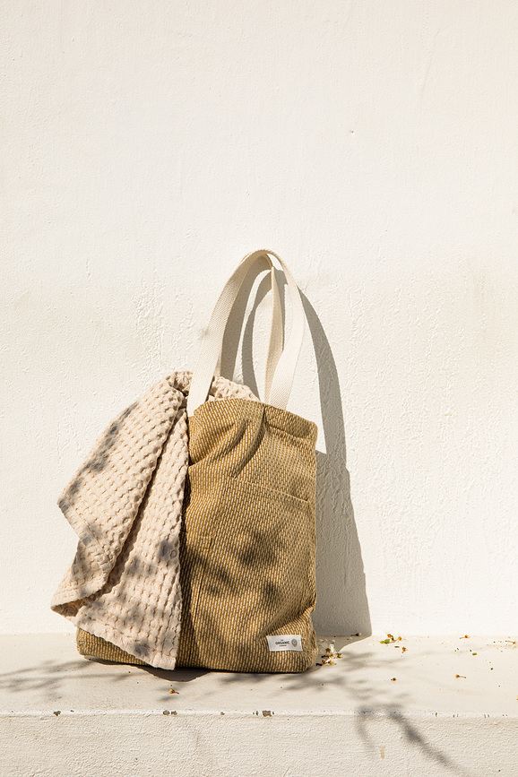 Piqué tygkasse beige